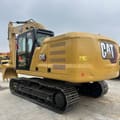 2023 Caterpillar 320GC crawler excavator, rear three-quarter view