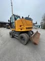 2018 Liebherr A910 Compact Litronic wheel excavator, rear three-quarter view