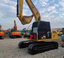 Caterpillar 312D2 crawler excavator, side view