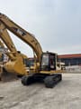 2023 Caterpillar 320BL crawler excavator, side view