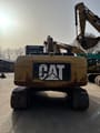2009 Caterpillar 320DL rupsgraafmachine, achteraanzicht