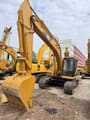 2015 Caterpillar 320B crawler excavator, front three-quarter view