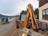 1988 CASE 680K backhoe loader, side view