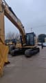 2021 Caterpillar 320GC crawler excavator, front three-quarter view