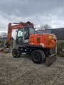 2008 Hitachi Zaxis 170W wheel excavator, rear three-quarter view