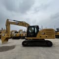 2023 Caterpillar 320GC crawler excavator side view