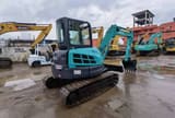 2015 Kobelco 55SR mini excavator, three-quarter front view