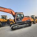 2024 Doosan DX225LCA crawler excavator, side profile view