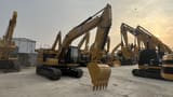 2024 Caterpillar 320GC crawler excavator, front three-quarter view