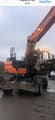 2019 Doosan DX140W-5 wheel excavator, front three-quarter view