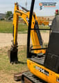 JCB 8014 CTS mini excavator, side view of boom and cab