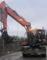 2019 Doosan DX140W-5 wheel excavator, front view
