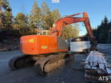 2004 Hitachi ZX225USR crawler excavator, rear three-quarter view