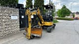 2018 Caterpillar 303E mini excavator, front three-quarter view