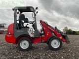 2011 Weidemann 1160 CC30 mini excavator, side view