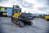 2009 Volvo EC210CNL crawler excavator, rear three-quarter view