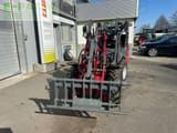 2022 Weidemann 1160 mini excavator, front view with fork attachment