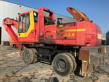 2000 O&K MH 6.5 wheel excavator, side view