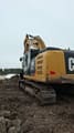 2017 Caterpillar 323F crawler excavator, rear three-quarter view