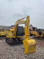 2023 Komatsu PC70-8 mini excavator, front three-quarter view