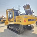 2024 Komatsu PC210 crawler excavator, rear three-quarter view