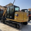 Caterpillar 308E2 mini excavator, rear three-quarter view