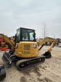 2019 Caterpillar 303.5ECR mini excavator, rear three-quarter view