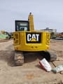 Caterpillar 310 Mini Excavator, rear view
