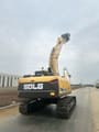 2025 SDLG E6215H Crawler Excavator from the rear, showcasing the counterweight and raised boom.