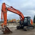 Hitachi ZX225 crawler excavator, side profile view