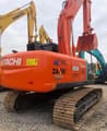 Hitachi ZAXIS 200 crawler excavator, rear three-quarter view
