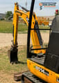 JCB 8014 CTS mini excavator, side view of boom and cab