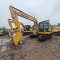 Komatsu PC120-6 crawler excavator, front three-quarter view