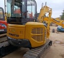 Komatsu PC50MR mini excavator, rear three-quarter view