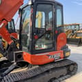 Kubota KX165-5 mini excavator, side view of the cab