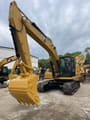 2022 Caterpillar 320GC crawler excavator, front three-quarter view