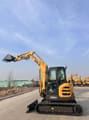 2025 SDLG ER655H Excavator showing the operator's cab with a person in a high-visibility vest inside.