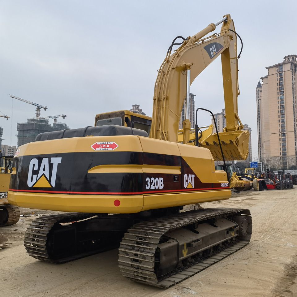 2016 Caterpillar 320B crawler excavator, rear three-quarter view