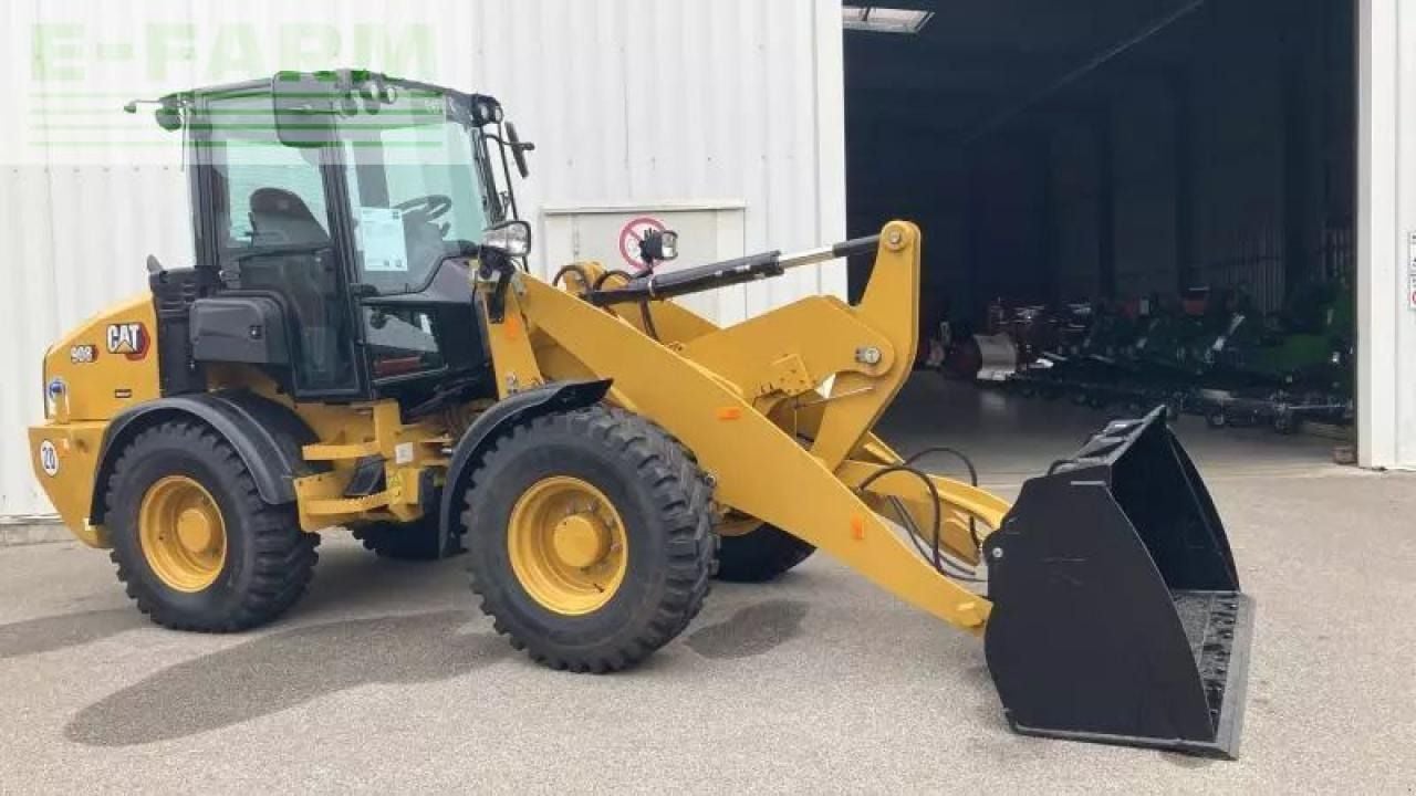 2023 Caterpillar 908 wheel loader, front three-quarter view 2023 Caterpillar 908 wheel loader, front three-quarter view