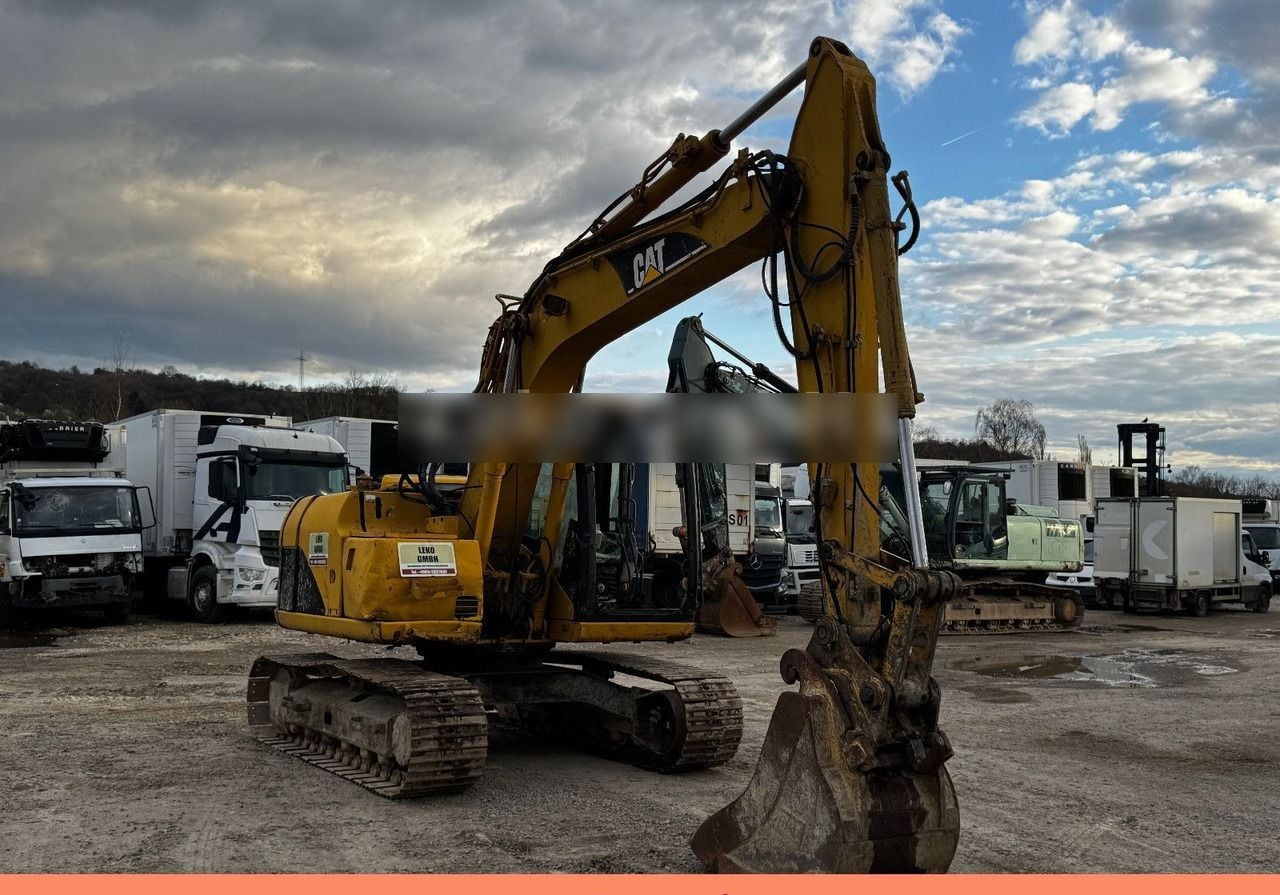 2005 Caterpillar 311C crawler excavator, side view