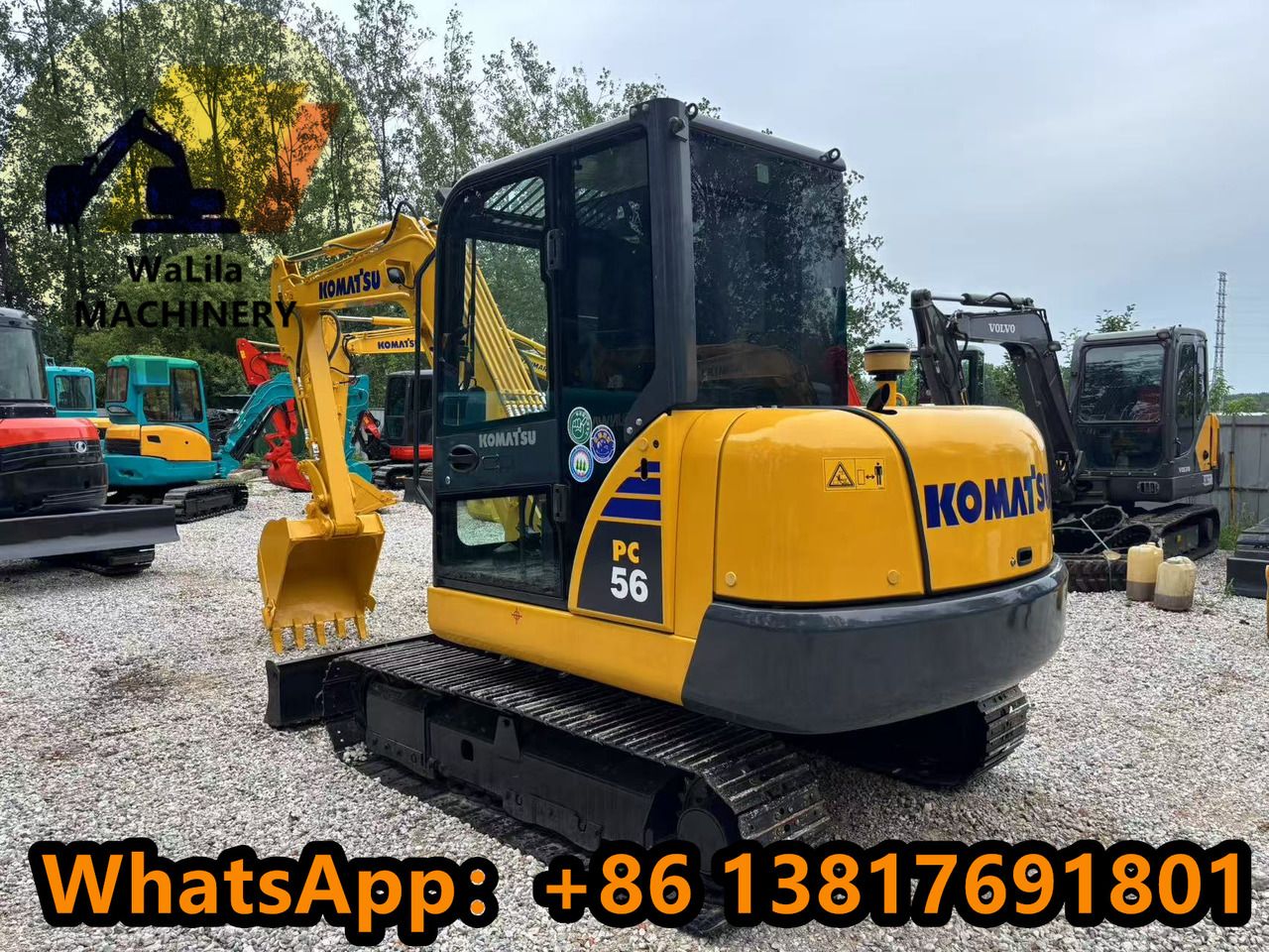 2023 Komatsu PC56-7 mini excavator, rear three-quarter view