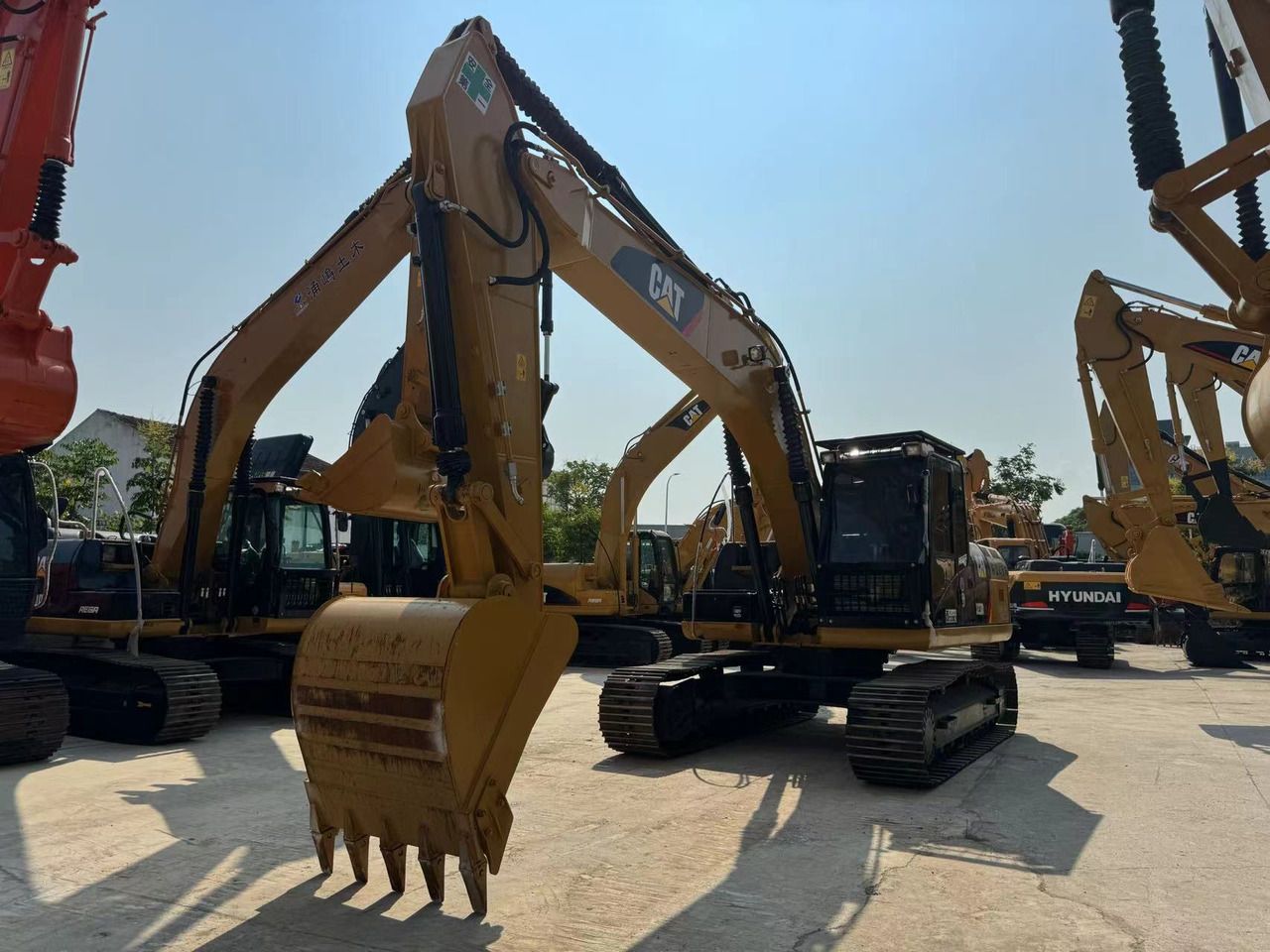 2022 Caterpillar 323D2L crawler excavator, front three-quarter view