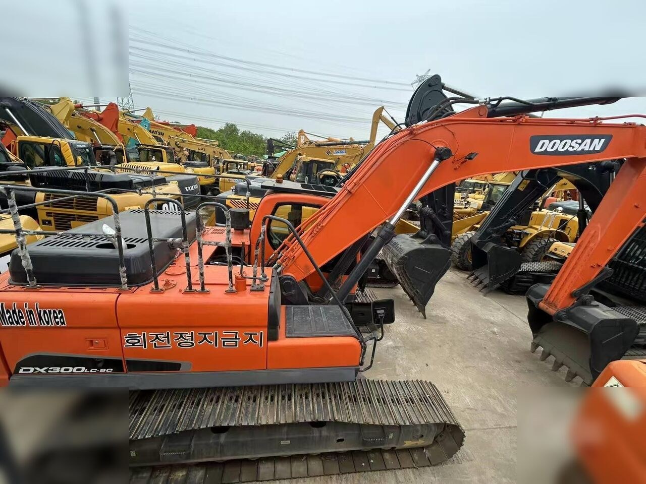 2021 Doosan DX300LC-9C crawler excavator, rear three-quarter view