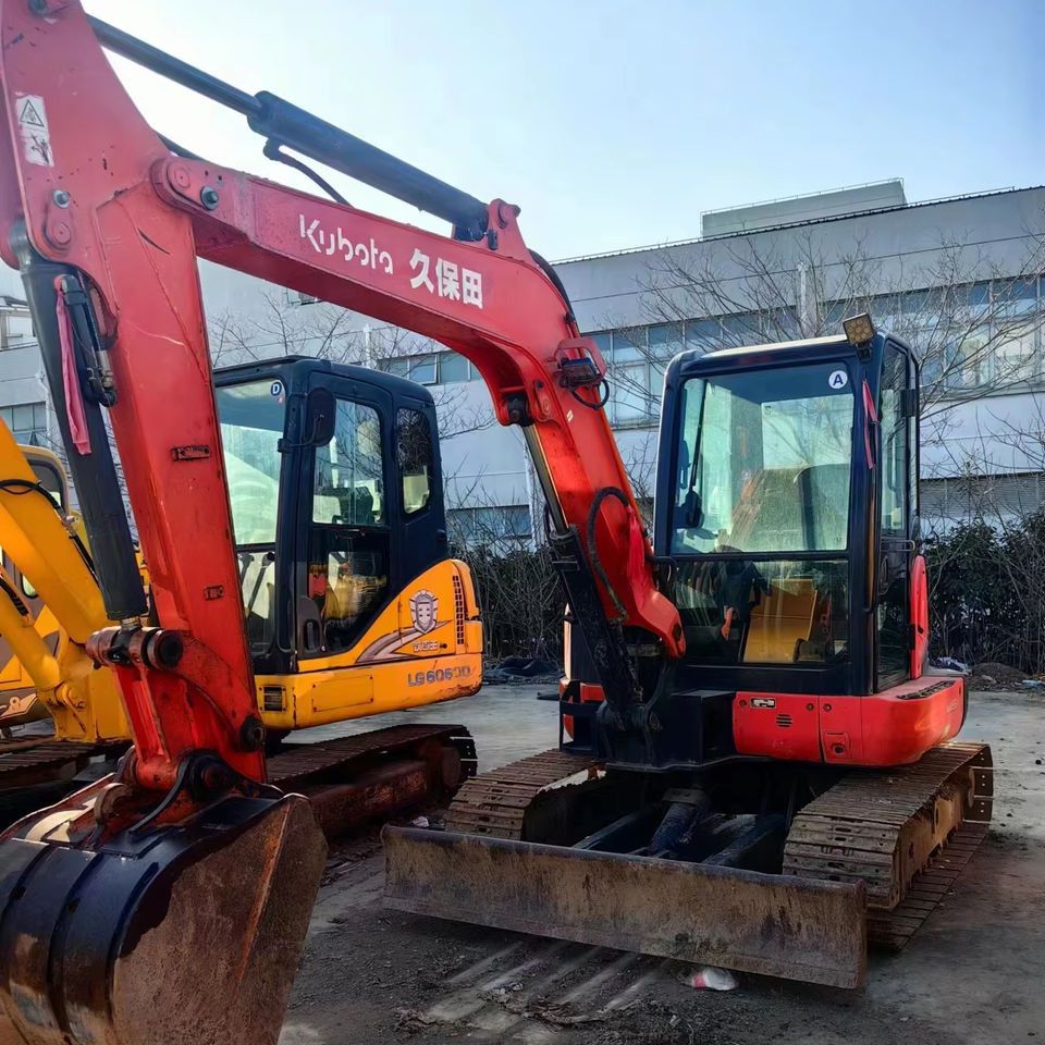 2021 Kubota KX155-5 mini excavator, front three-quarter view 2021 Kubota KX155-5 mini excavator, front three-quarter view