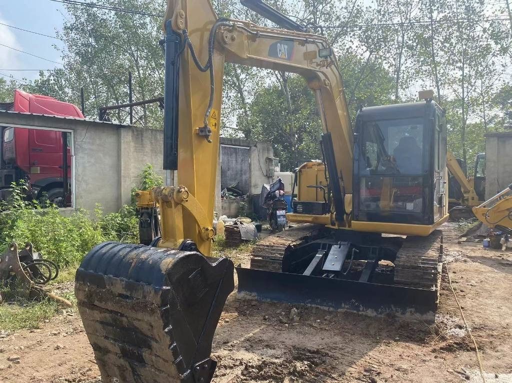 2024 Caterpillar 308E2 mini excavator, front three-quarter view