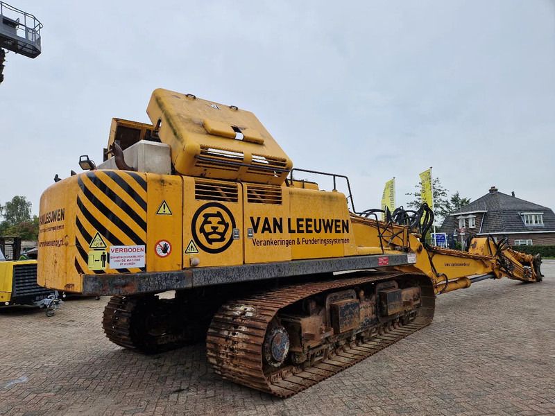 PMI Woltman 955LC crawler excavator, rear three-quarter view