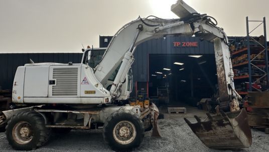 2005 CASE WX165 wheel excavator, side view