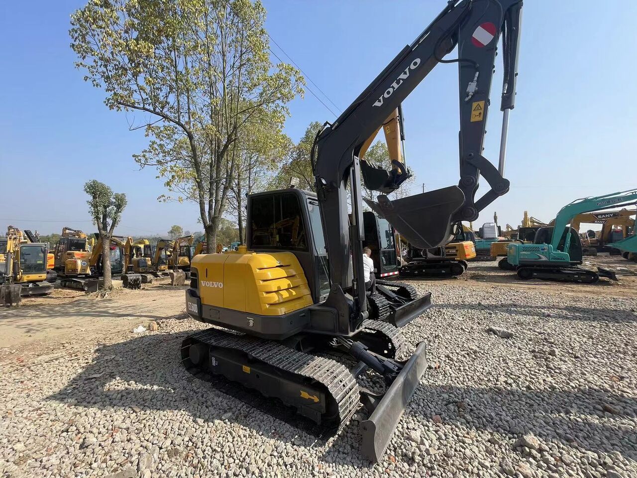 2024 Volvo EC60D mini excavator, rear three-quarter view
