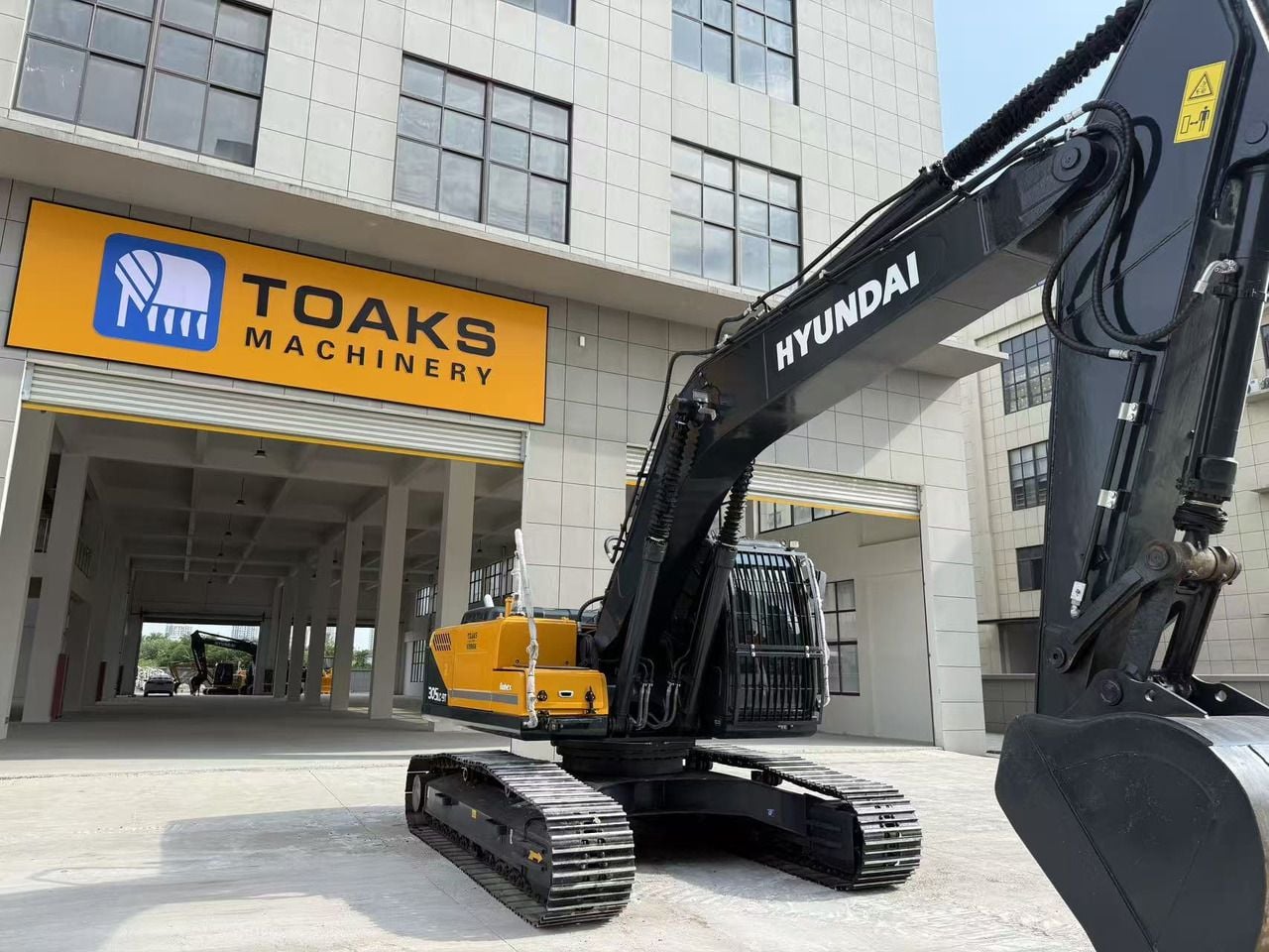 2024 Hyundai R305LC-9T crawler excavator, rear three-quarter view