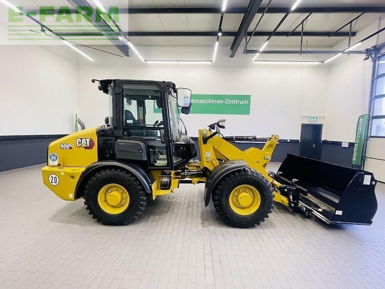 2023 Caterpillar 906-14A wheel loader, side view 2023 Caterpillar 906-14A wheel loader, side view